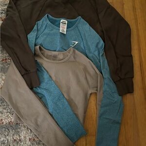 Set of 2 crop active tops + 1 crop sweater Echt and Gymshark